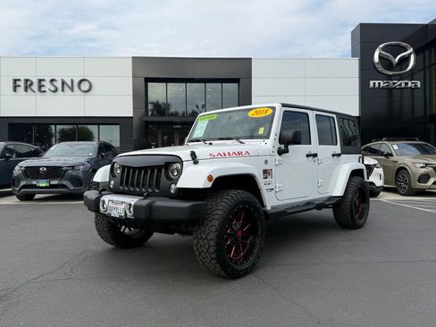 Used 2018 Jeep Wrangler Unlimited Sahara AWD/4WD image 1