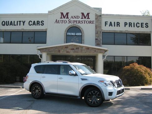 Used 2018 Nissan Armada Platinum w/ Captain Seat Package RWD image 1