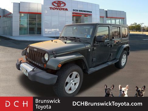 Used 2012 Jeep Wrangler Unlimited Sahara w/ Dual Top Group image 1