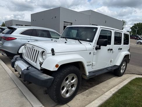Used 2015 Jeep Wrangler Unlimited Sahara AWD/4WD image 1