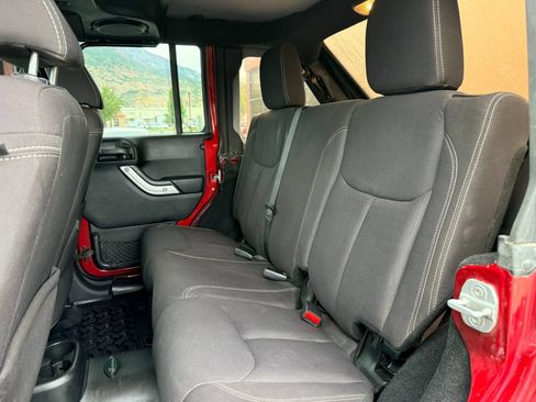 Used 2013 Jeep Wrangler Unlimited Rubicon w/ Dual Top Group AWD/4WD image 26