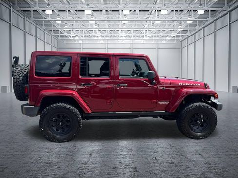 Used 2012 Jeep Wrangler Unlimited Rubicon w/ Dual Top Group AWD/4WD image 8