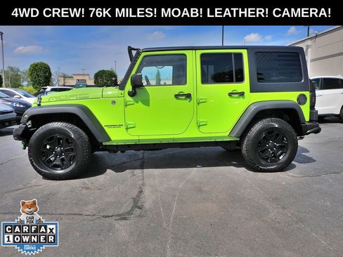 Used 2013 Jeep Wrangler Unlimited Sahara AWD/4WD image 1