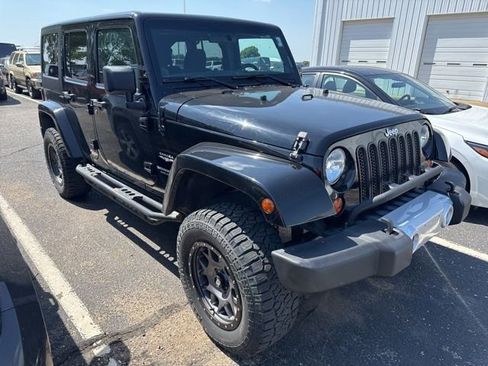 Used 2011 Jeep Wrangler Unlimited Sahara w/ Connectivity Group AWD/4WD image 1
