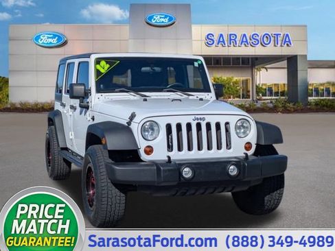 Used 2012 Jeep Wrangler Unlimited Sport image 1