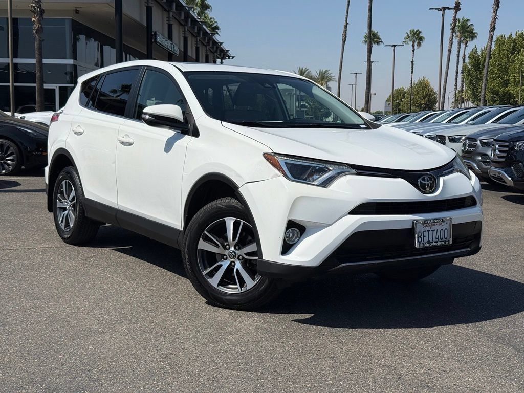 Used 2018 Toyota RAV4 XLE w/ All Weather Liner Package FWD image 1