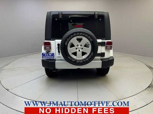 Used 2013 Jeep Wrangler Unlimited Sahara w/ Dual Top Group AWD/4WD image 4