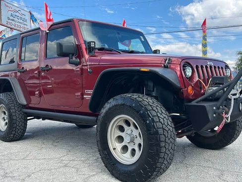 Used 2012 Jeep Wrangler Unlimited Sport image 1