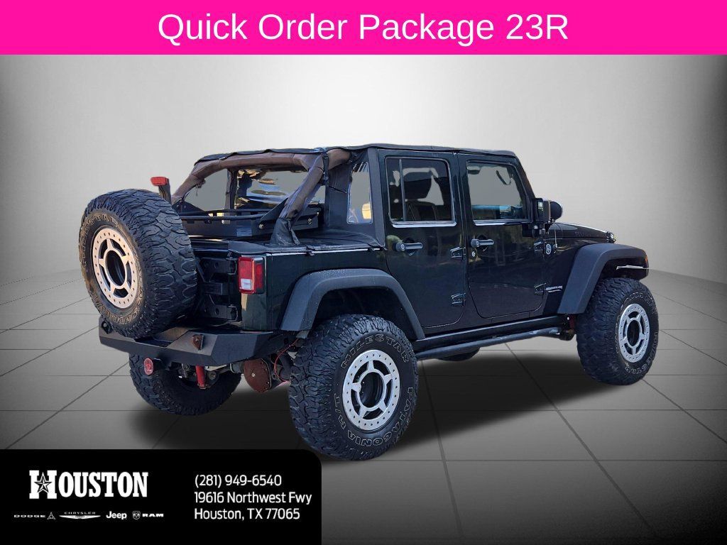 Used 2012 Jeep Wrangler Unlimited Rubicon w/ Max Tow Pkg AWD/4WD image 4