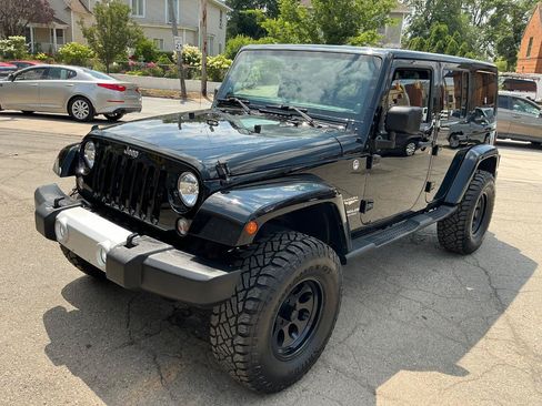 Used 2014 Jeep Wrangler Unlimited Sahara w/ Katzin Premium Leather Group AWD/4WD image 8