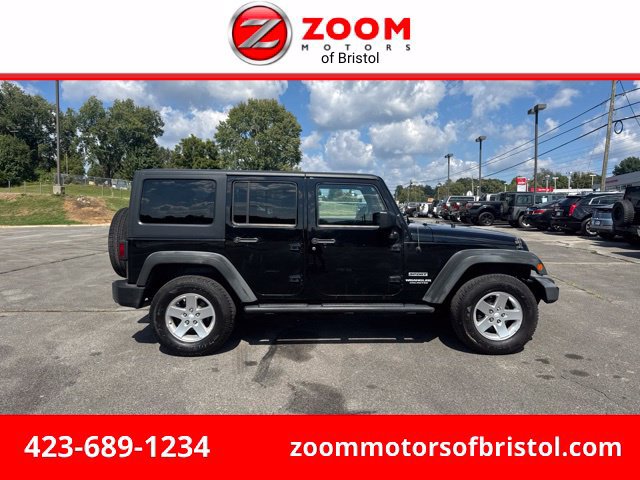 Used 2012 Jeep Wrangler Unlimited Sport AWD/4WD image 1