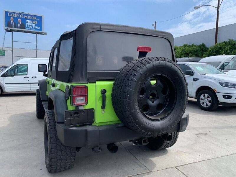 Used 2013 Jeep Wrangler Unlimited Sport w/ Mopar Black Appearance Group AWD/4WD image 5