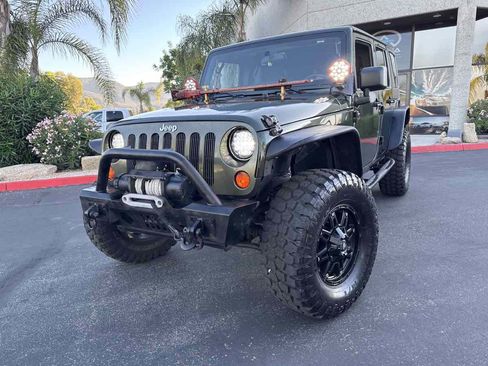 Used 2012 Jeep Wrangler Unlimited Sport image 2
