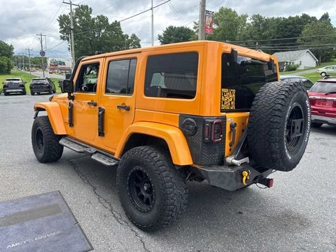 Used 2012 Jeep Wrangler Unlimited Sahara w/ Dual Top Group AWD/4WD image 4