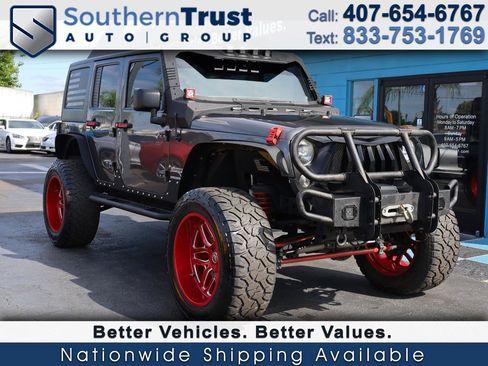Used 2014 Jeep Wrangler Unlimited Sport AWD/4WD image 1