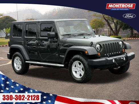 Used 2010 Jeep Wrangler Unlimited Sport image 1
