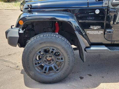 Used 2013 Jeep Wrangler Unlimited Sahara AWD/4WD image 9