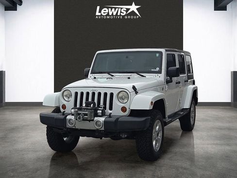 Used 2013 Jeep Wrangler Unlimited Sahara w/ Connectivity Group AWD/4WD image 1