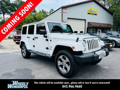 Used 2018 Jeep Wrangler Unlimited Sahara AWD/4WD image 1