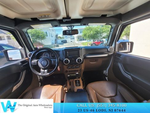 Used 2014 Jeep Wrangler Unlimited Sahara w/ Dual Top Group AWD/4WD image 14