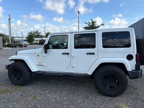 Used 2015 Jeep Wrangler Unlimited Sahara w/ Dual Top Group AWD/4WD image 8