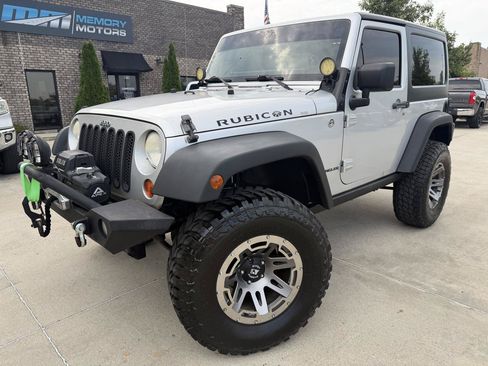 Used 2010 Jeep Wrangler Rubicon w/ Dual Top Group AWD/4WD image 1