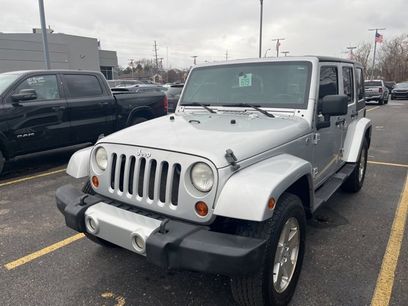 Used 2009 Jeep Wrangler Unlimited Sahara w/ Dual Top Group