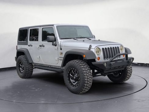 Used 2012 Jeep Wrangler Unlimited Sport AWD/4WD image 1