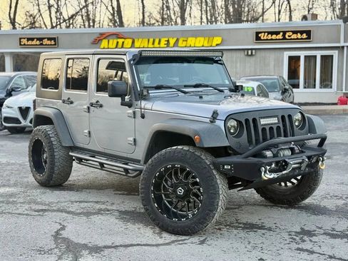 Used 2015 Jeep Wrangler Unlimited Sport image 1