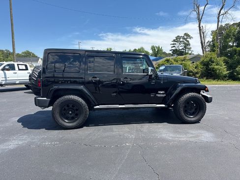 Used 2013 Jeep Wrangler Unlimited Sahara w/ Mopar Chrome Edition Group AWD/4WD image 6