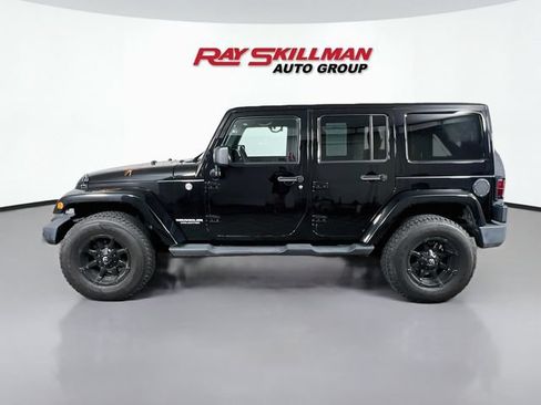 Used 2011 Jeep Wrangler Unlimited Sport AWD/4WD image 4