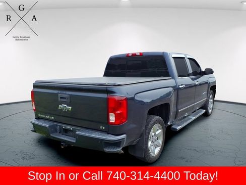 Used 2018 Chevrolet Silverado 1500 LTZ Z71 w/ Centennial Edition AWD/4WD image 3