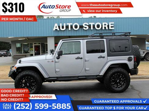Used 2014 Jeep Wrangler Unlimited Sahara w/ Max Tow Package image 1