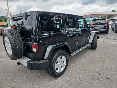 Used 2012 Jeep Wrangler Unlimited Sahara w/ Dual Top Group AWD/4WD image 3