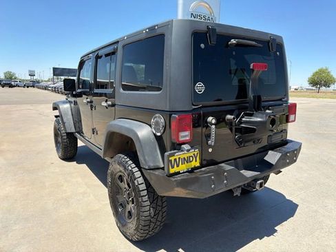 Used 2012 Jeep Wrangler Unlimited Rubicon w/ Dual Top Group AWD/4WD image 5
