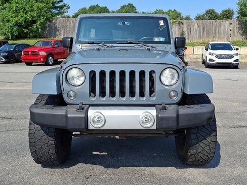 Used 2014 Jeep Wrangler Unlimited Sahara w/ Dual Top Group AWD/4WD image 2