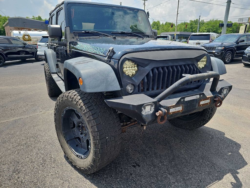 Used 2014 Jeep Wrangler Unlimited Rubicon w/ Connectivity Group AWD/4WD image 3
