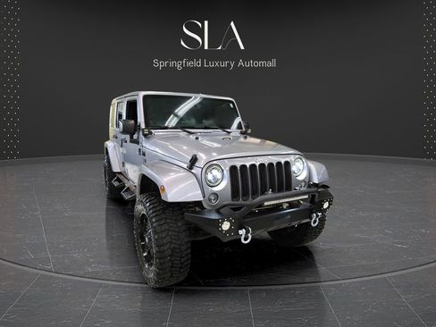 Used 2014 Jeep Wrangler Unlimited Sahara w/ Dual Top Group AWD/4WD image 1