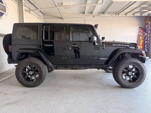 Used 2014 Jeep Wrangler Unlimited Sahara AWD/4WD image 9