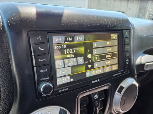 Used 2014 Jeep Wrangler Unlimited Sahara w/ Dual Top Group AWD/4WD image 13