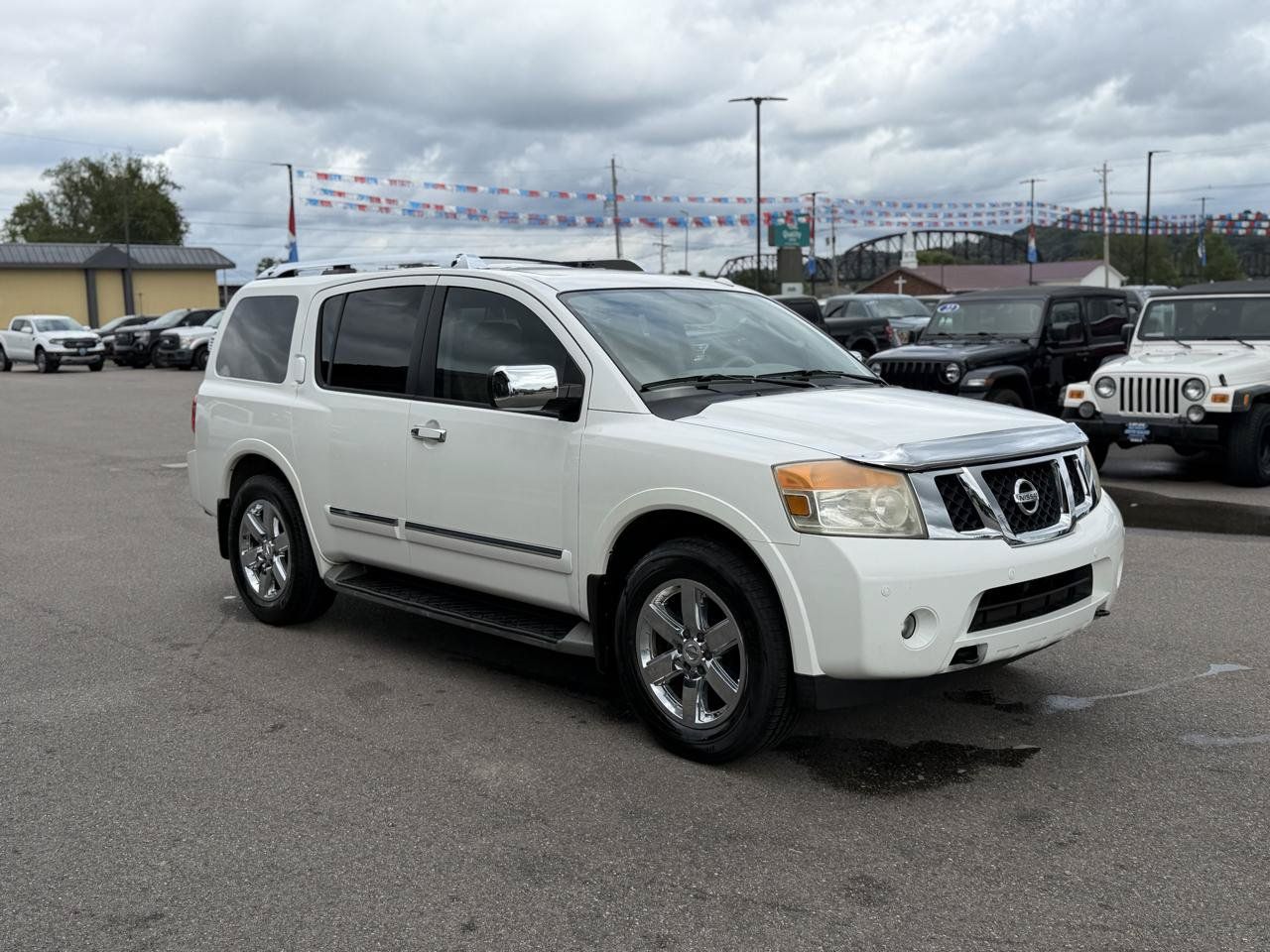 Used 2011 Nissan Armada Platinum w/ 2nd Row Captain Seat Pkg AWD/4WD image 3