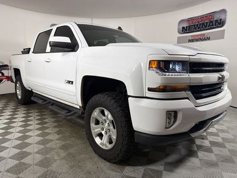 Used 2018 Chevrolet Silverado 1500 LT w/ Texas Edition AWD/4WD image 1
