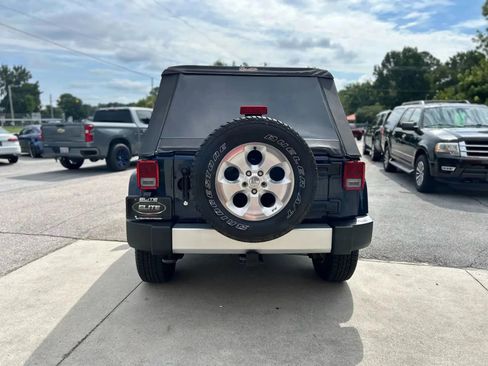 Used 2013 Jeep Wrangler Unlimited Sahara w/ Dual Top Group image 8