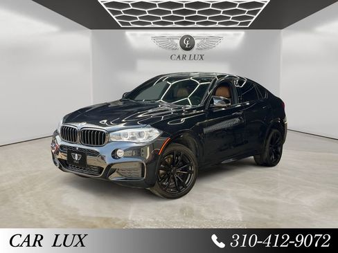 Used 2018 BMW X6 xDrive35i w/ M Sport Package AWD/4WD image 1