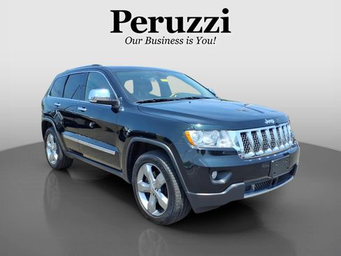 Used 2013 Jeep Grand Cherokee Overland w/ Advance Technology Group AWD/4WD image 1