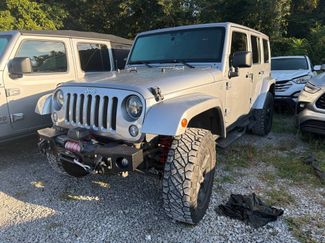 Used 2014 Jeep Wrangler Unlimited Sahara AWD/4WD video 1