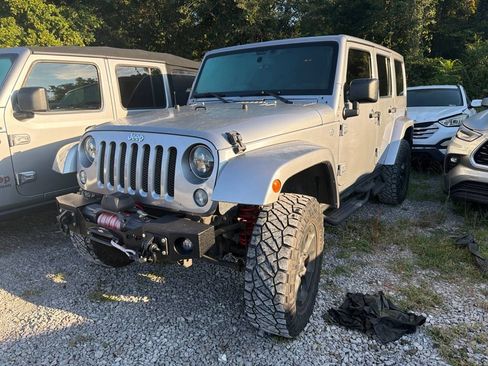 Used 2014 Jeep Wrangler Unlimited Sahara AWD/4WD image 1