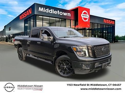 Used 2019 Nissan Titan SL w/ Midnight Edition AWD/4WD image 1