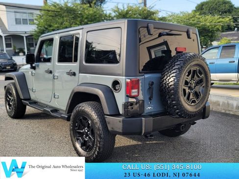 Used 2015 Jeep Wrangler Unlimited Sport w/ Dual Top Group AWD/4WD image 4