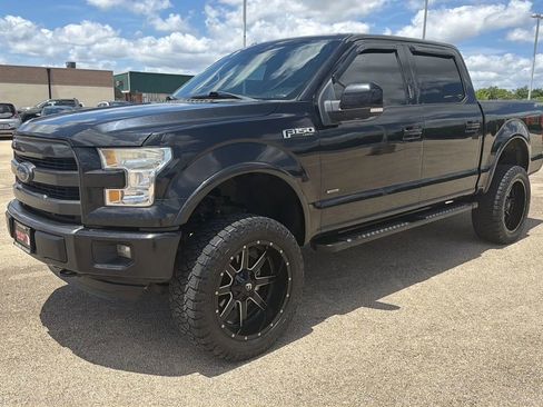 Used 2015 Ford F150 Lariat AWD/4WD image 1